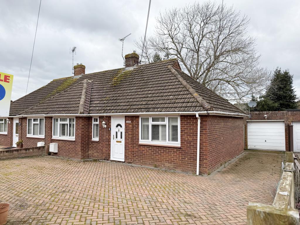 Lot: 12 - SEMI-DETACHED BUNGALOW FOR IMPROVEMENT - Front of bungalow